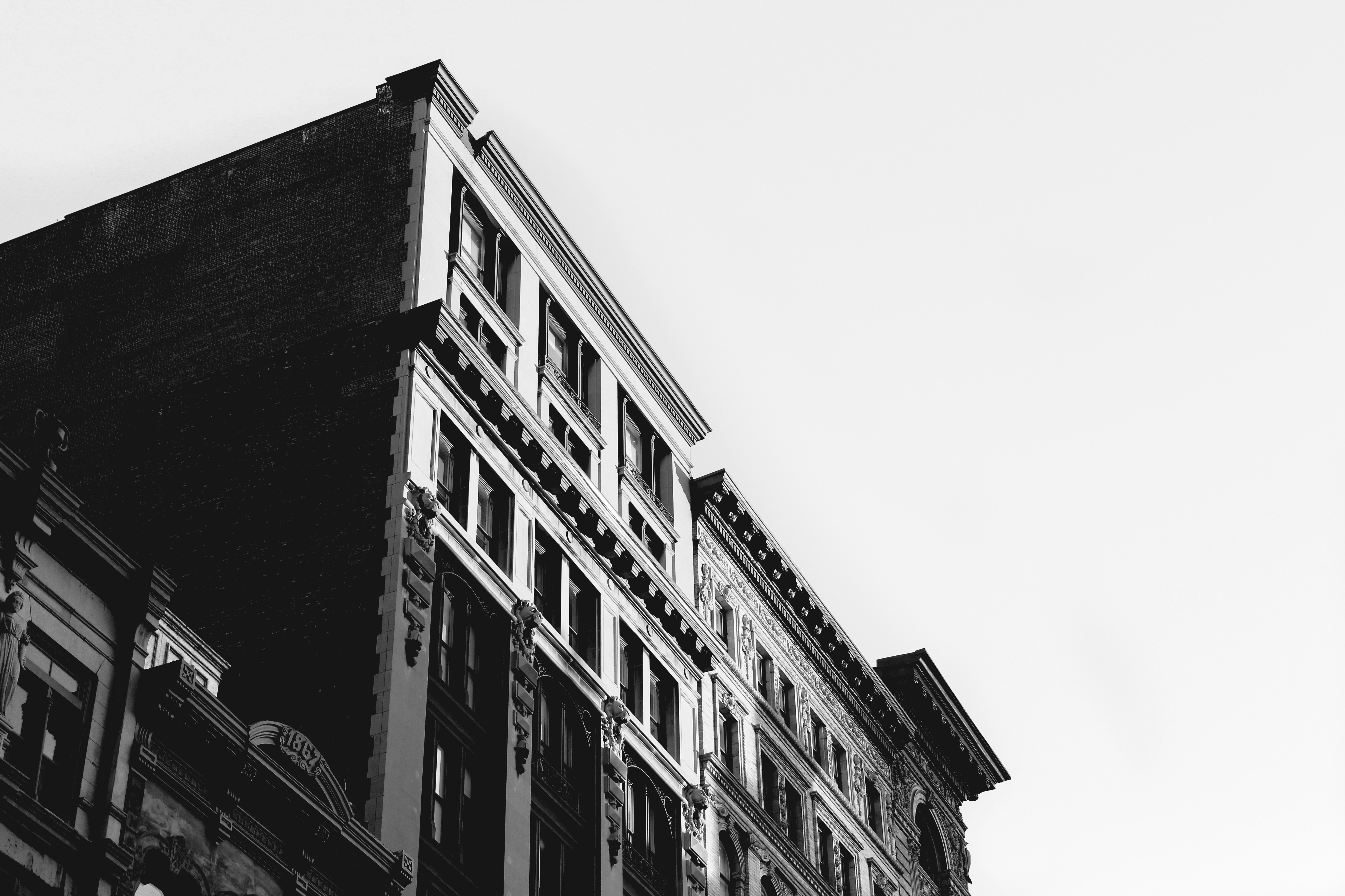 grayscale photo of concrete building