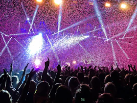 silhouette of people in concert