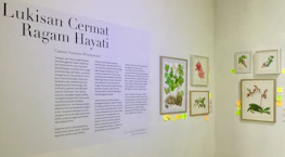 Interactive screen showing cultural stories and media about pecel.