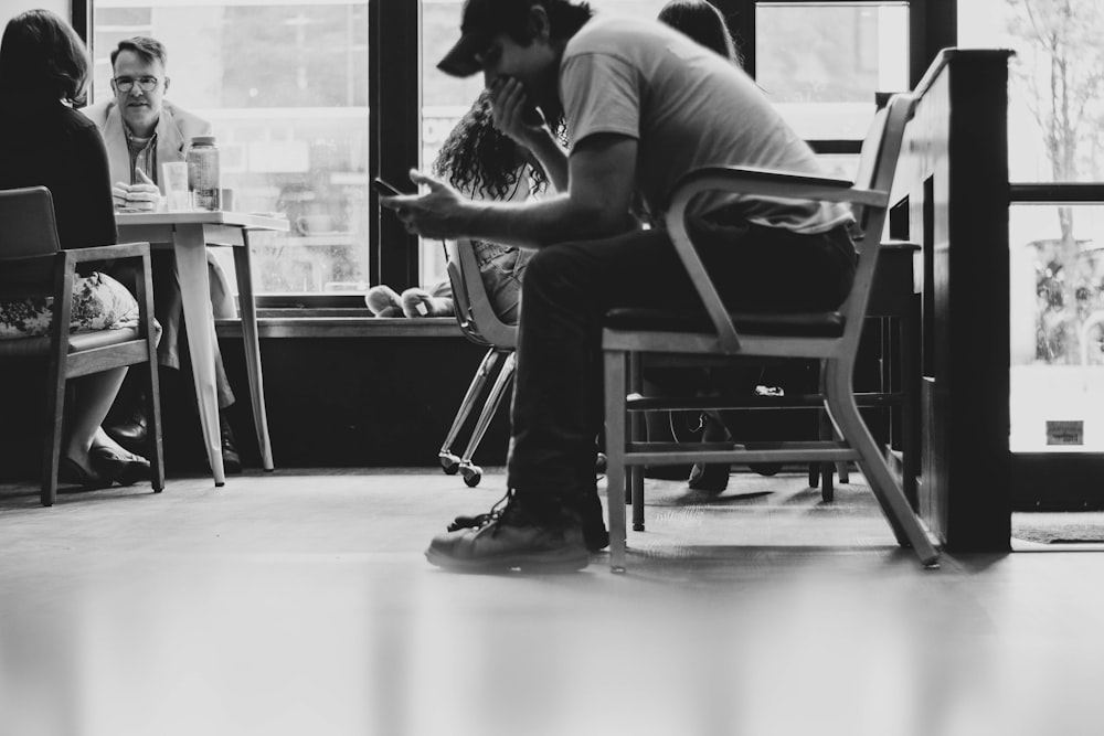 man sitting on chair