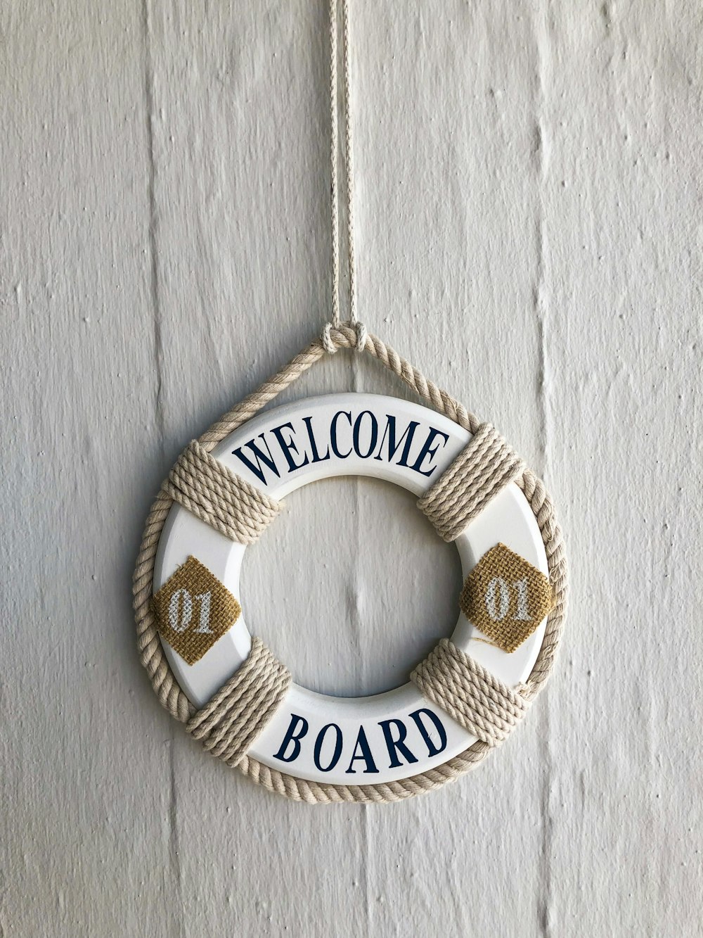 hanging white and brown swim ring