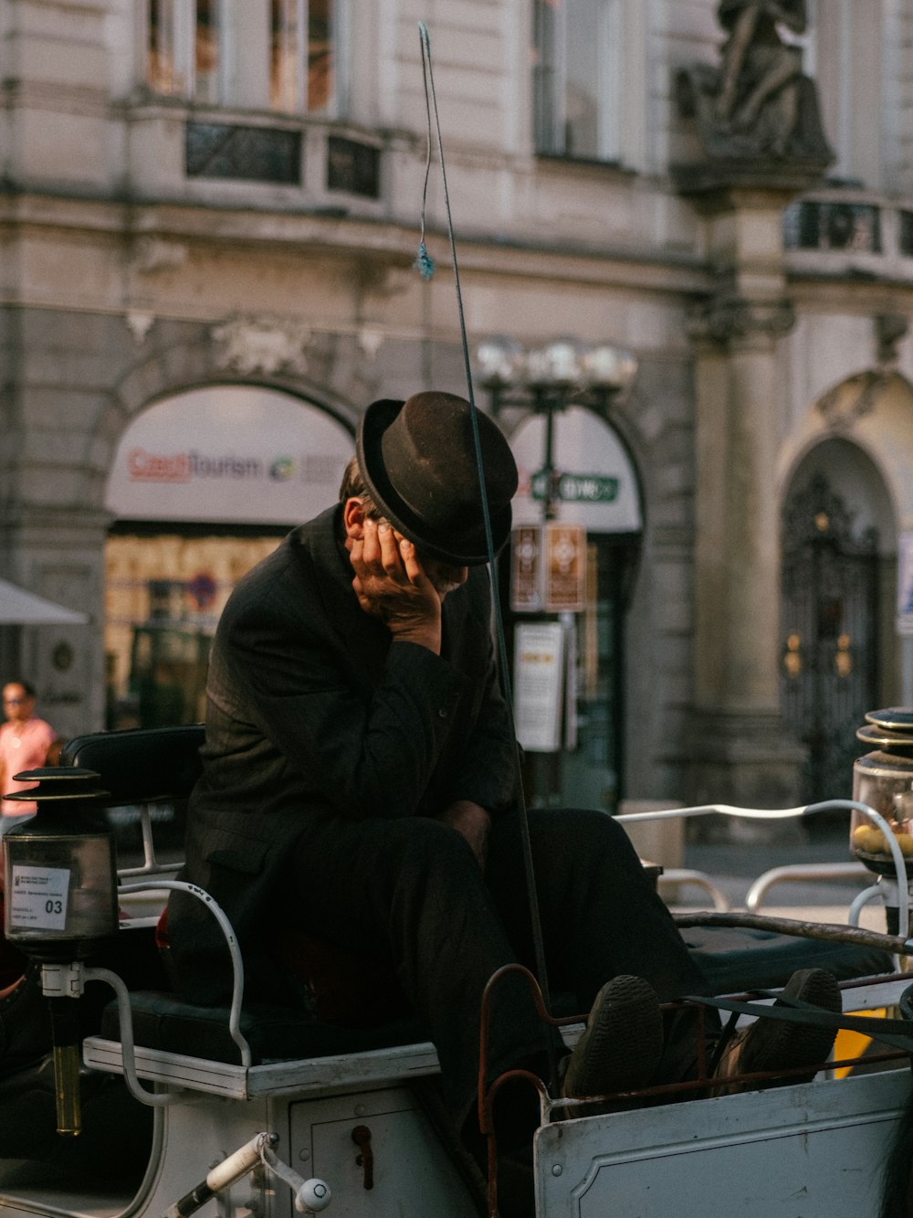 man wearing black hat