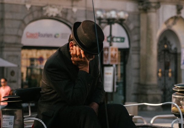 man wearing black hat