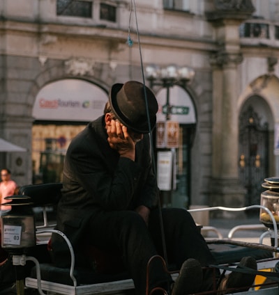 man wearing black hat