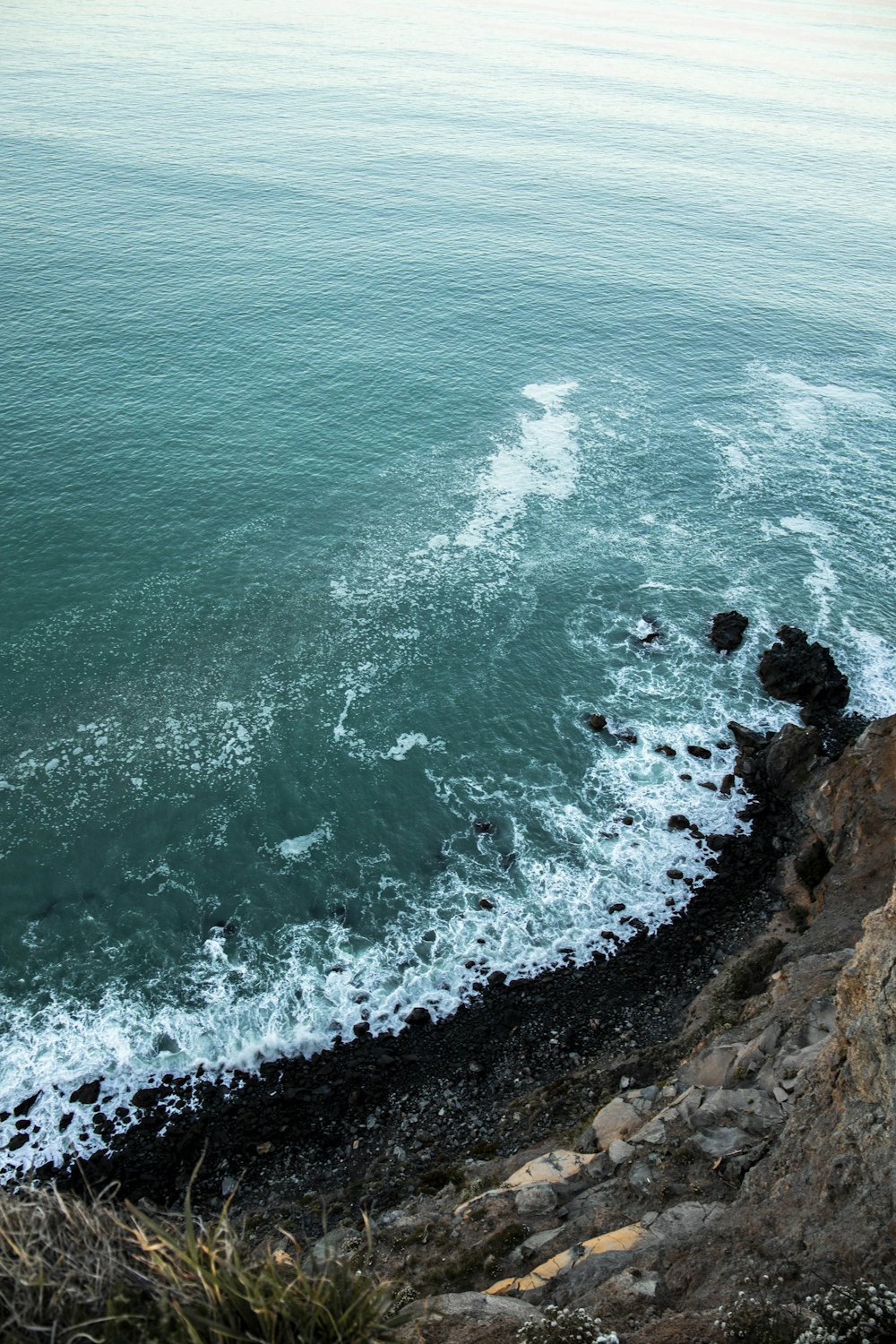 high angle photography of body of water during daytime