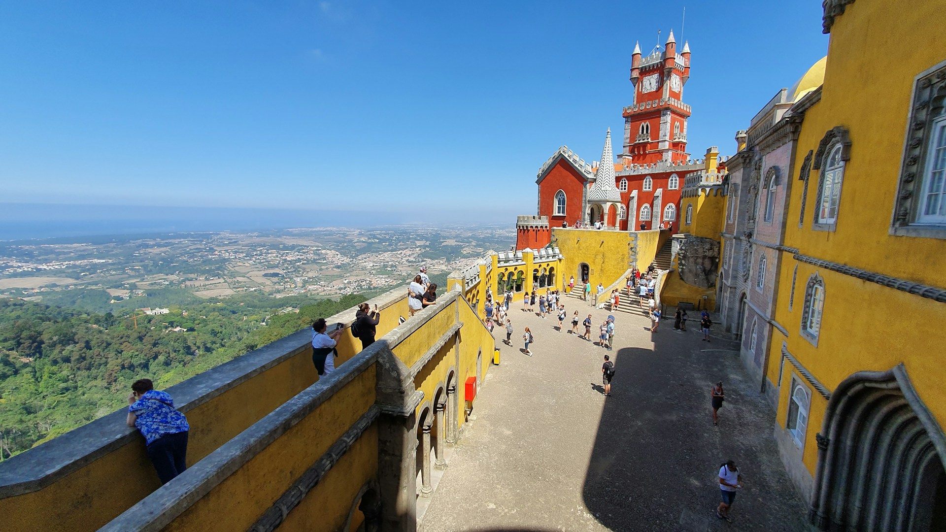 black and brown leather padded tub sofa