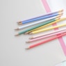 assorted-color pencil lot on white surface