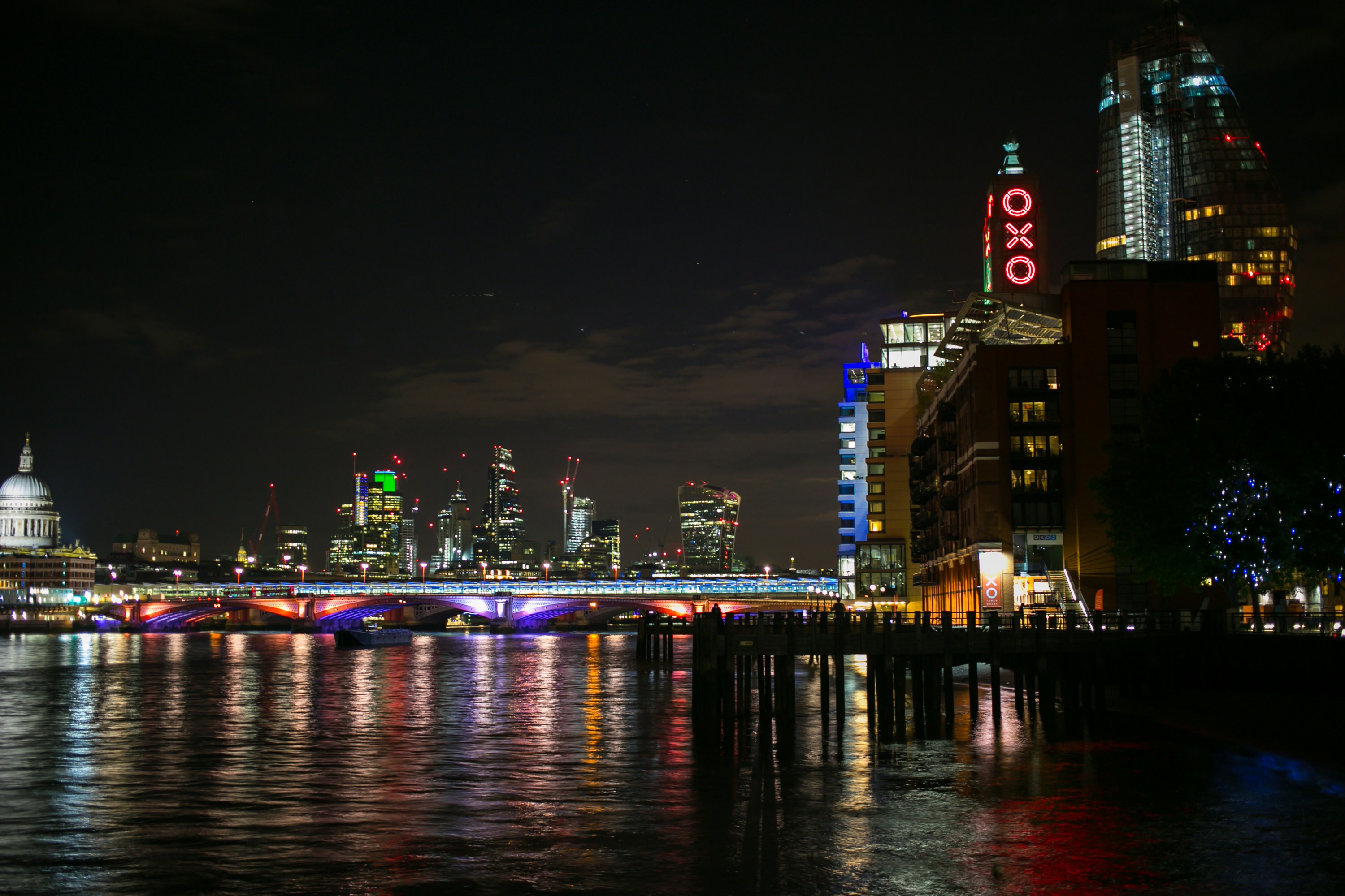 lighted buildings at daytime, London at night