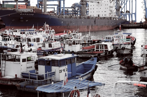 A stunning view of various vessels docked at a busy port.