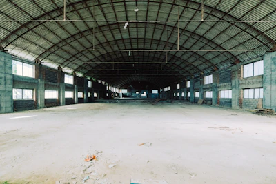 Interior shot of a spacious, well-lit warehouse ready for rent