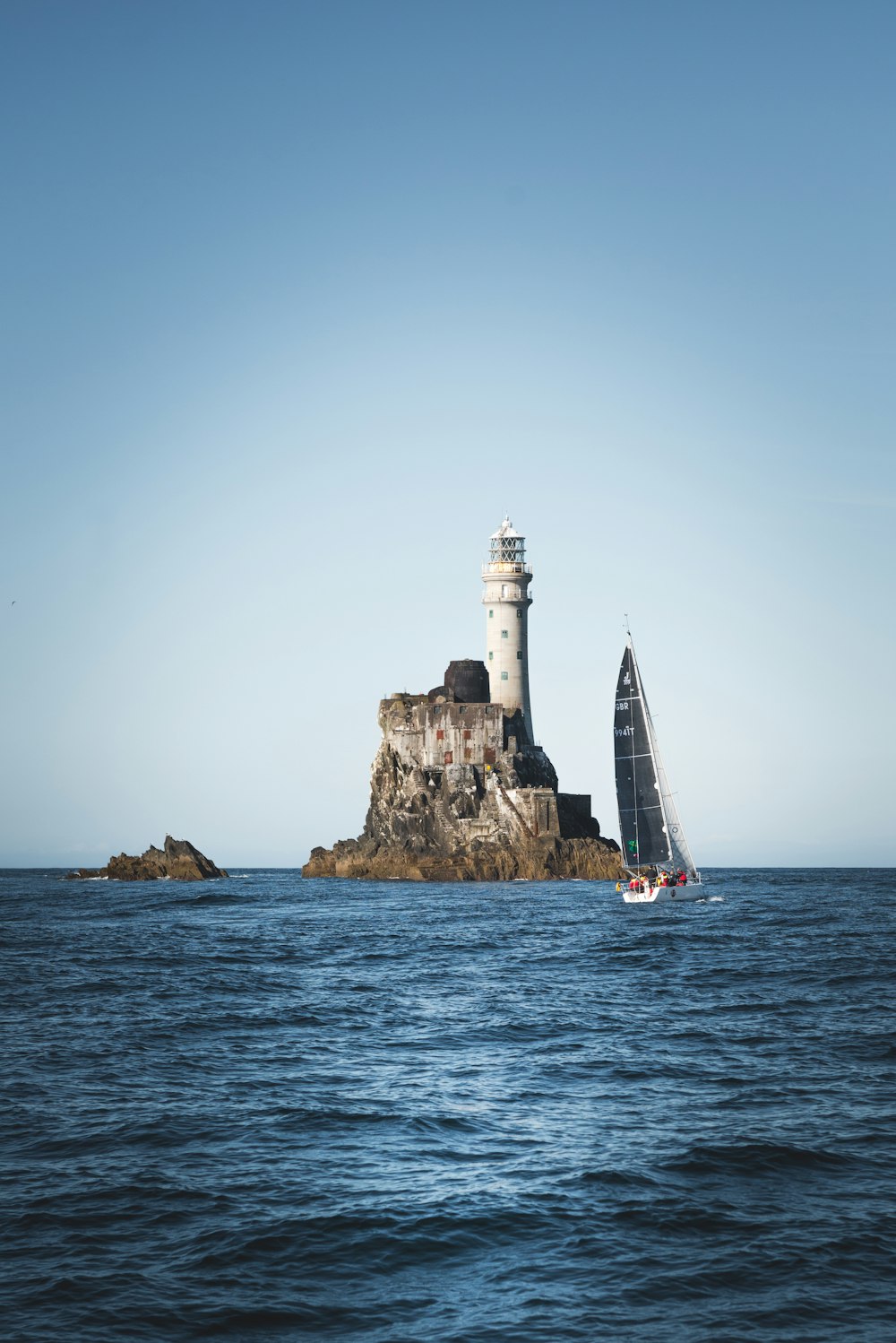 lighthouse surrounded by water