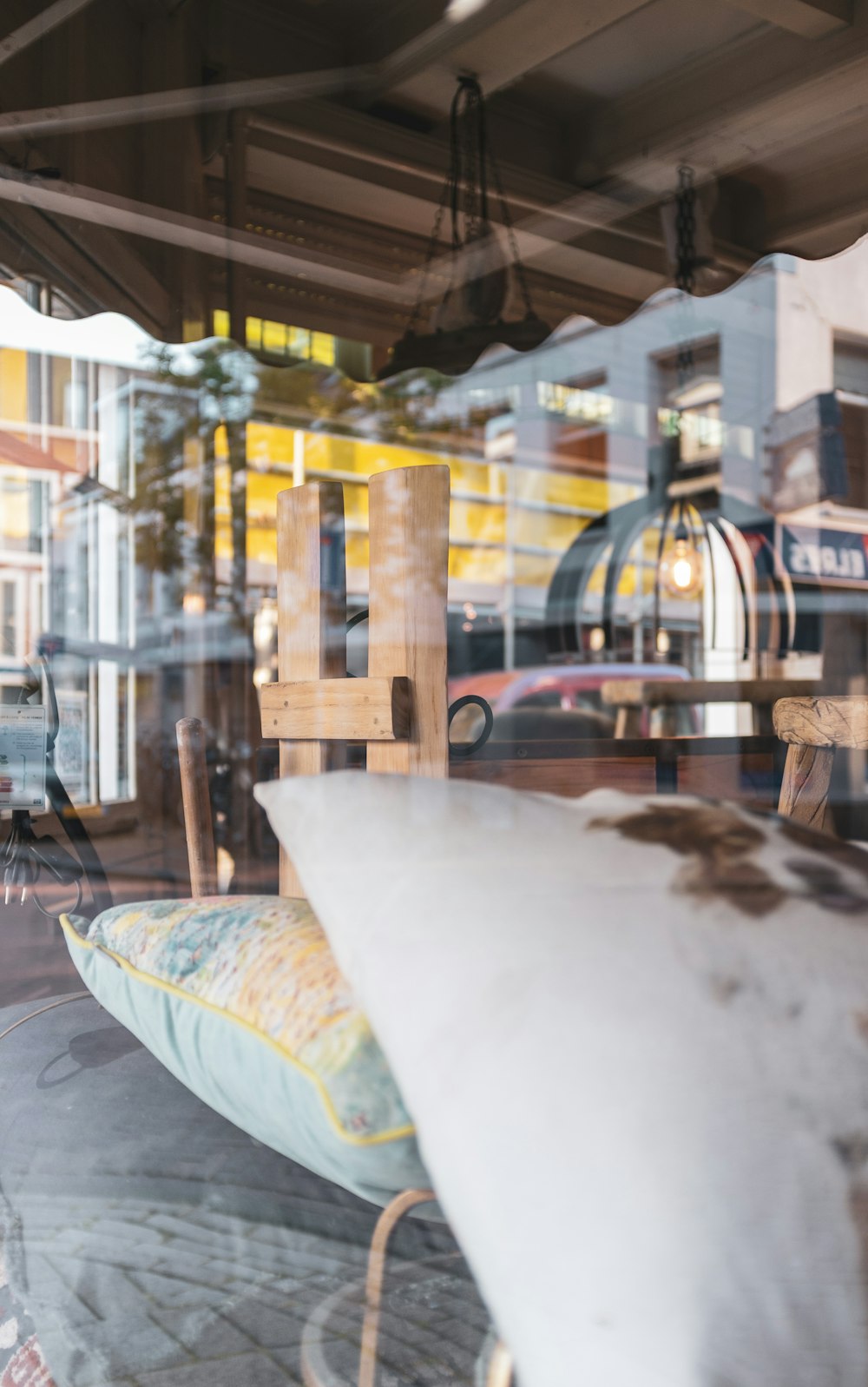 a window display with pillows and other items