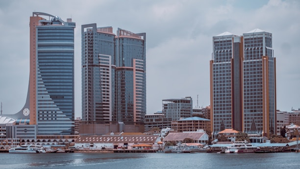 body of water near buildings at daytime