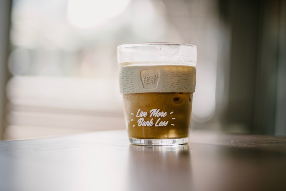 cup of coffee on wooden surface