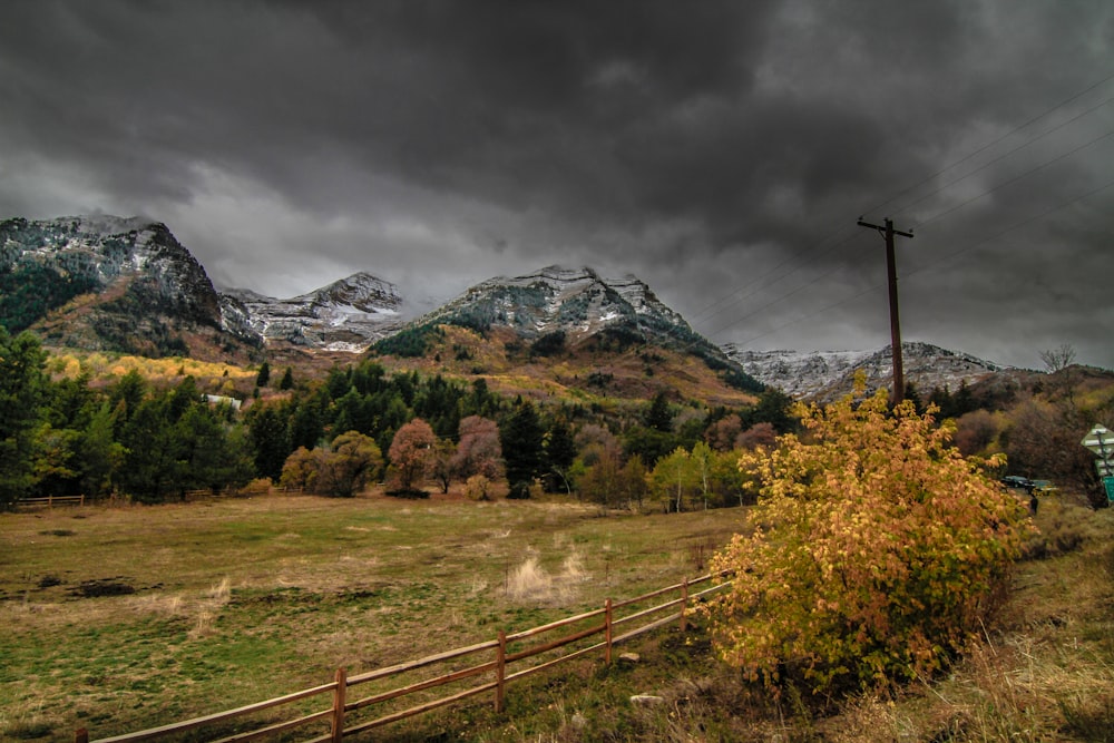 mountains under cloudy sky during daytime