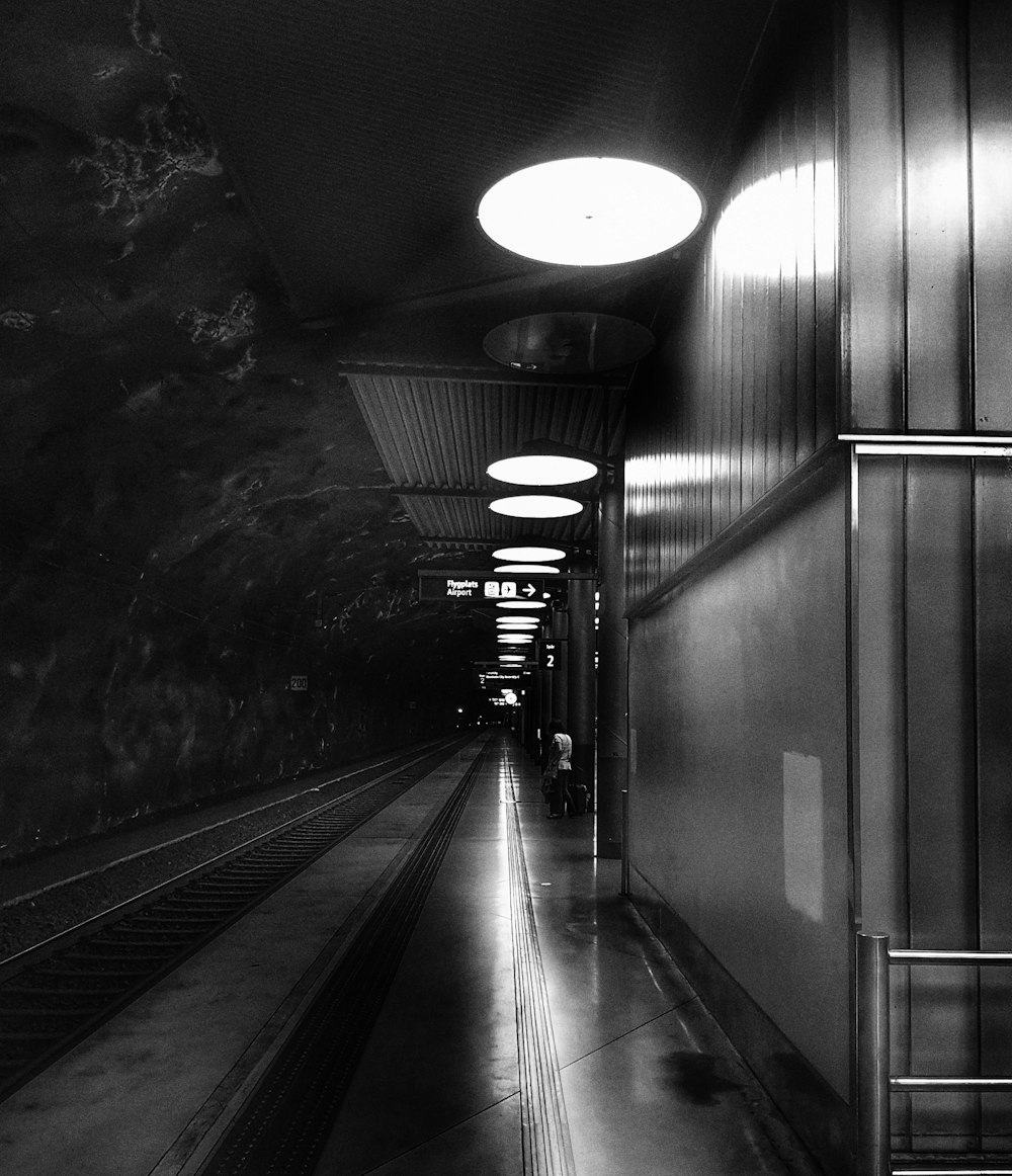 grayscale photo of train station