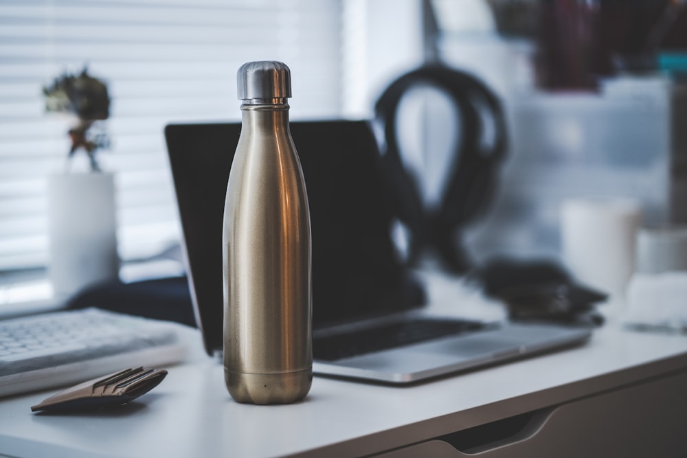 gray vacuum flask on table