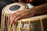 a close up of a person playing a musical instrument