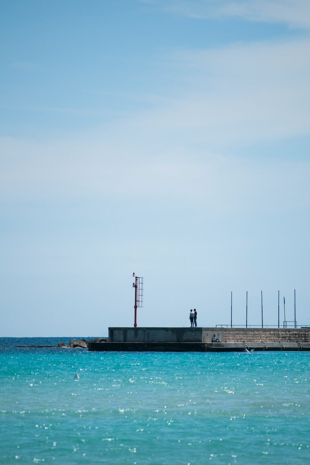 two person standing under blue sky during daytime