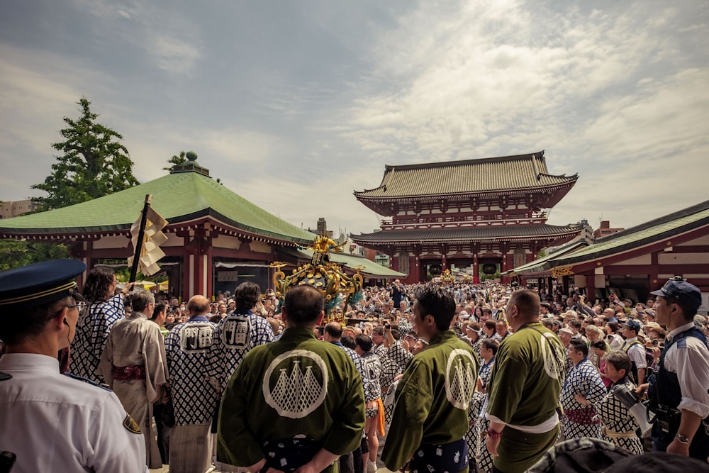 group of people in front of temple