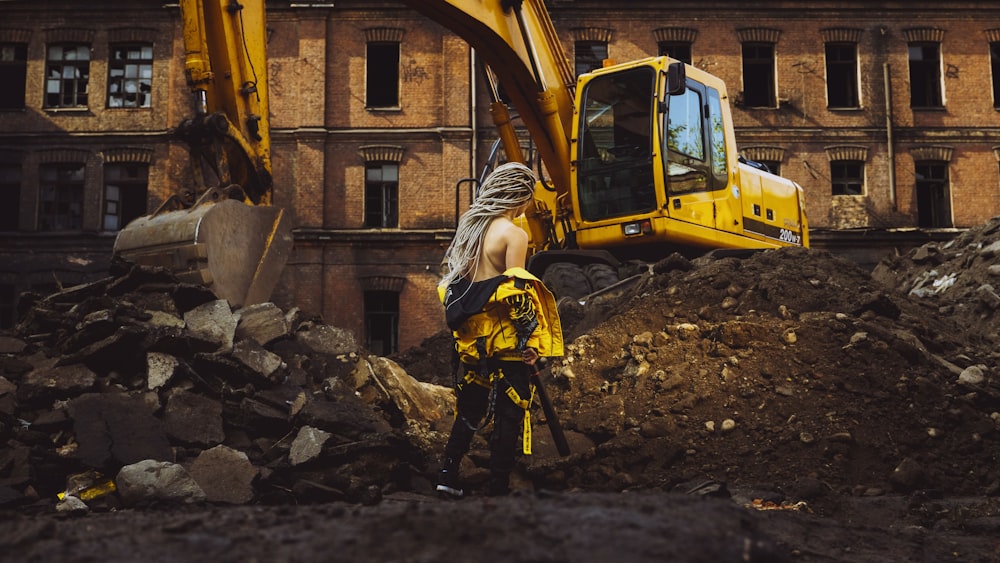 woman near the excavator