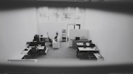 A well-maintained office space with neat desks and clean floors.