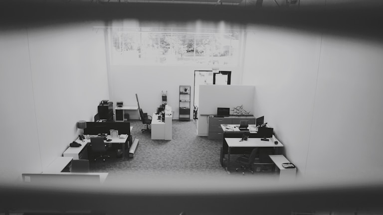A bright office space being thoroughly cleaned by professionals.