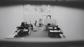 Wide shot of a freshly cleaned office space with shining floors and spotless windows.