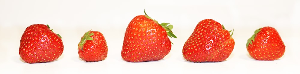 five red strawberries