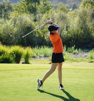 woman playing golf