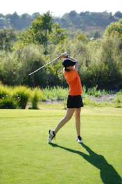 woman playing golf