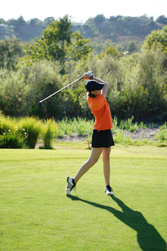 woman playing golf