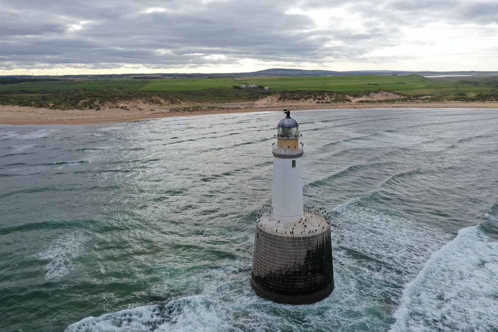 architectural photography of white lighthouse