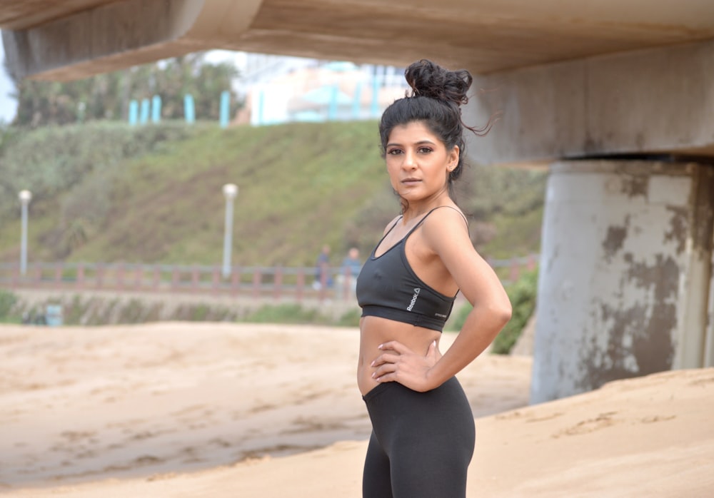 woman wearing black sports bra