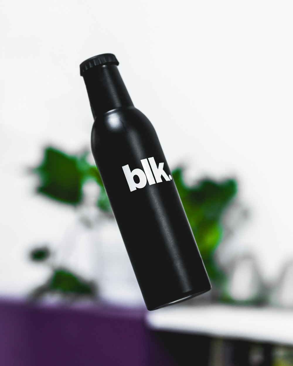black and white Blk glass bottle