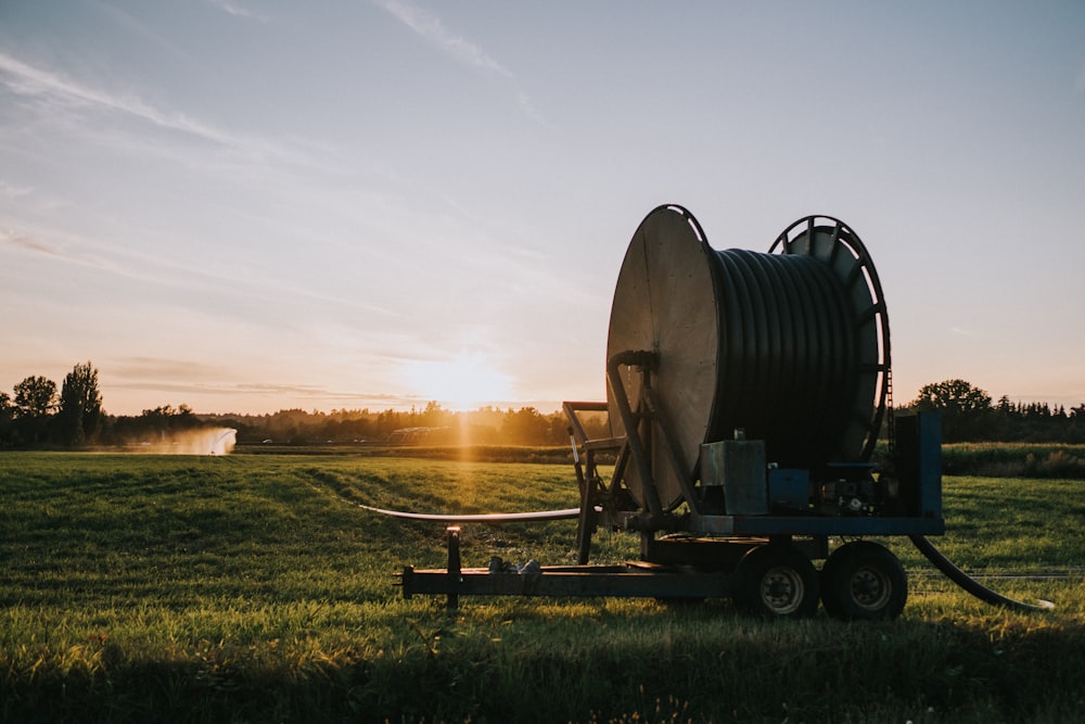 hose reel in farm during sunrise