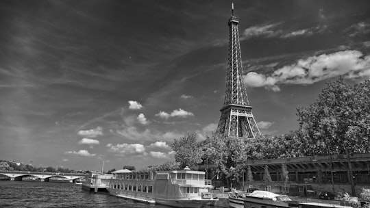 grayscale photo of Eiffel Tower, Paris in Tour Eiffel - Parc du Champ-de-Mars France