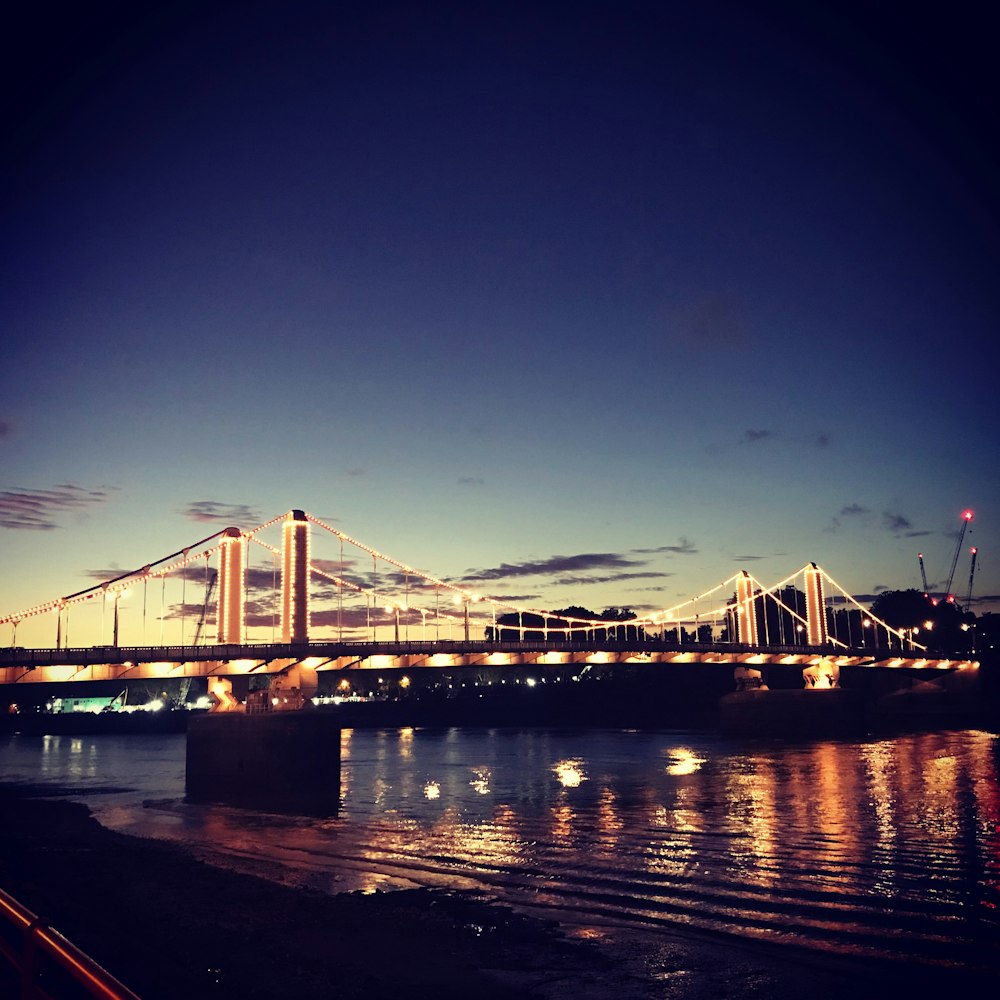 lit bridge at night