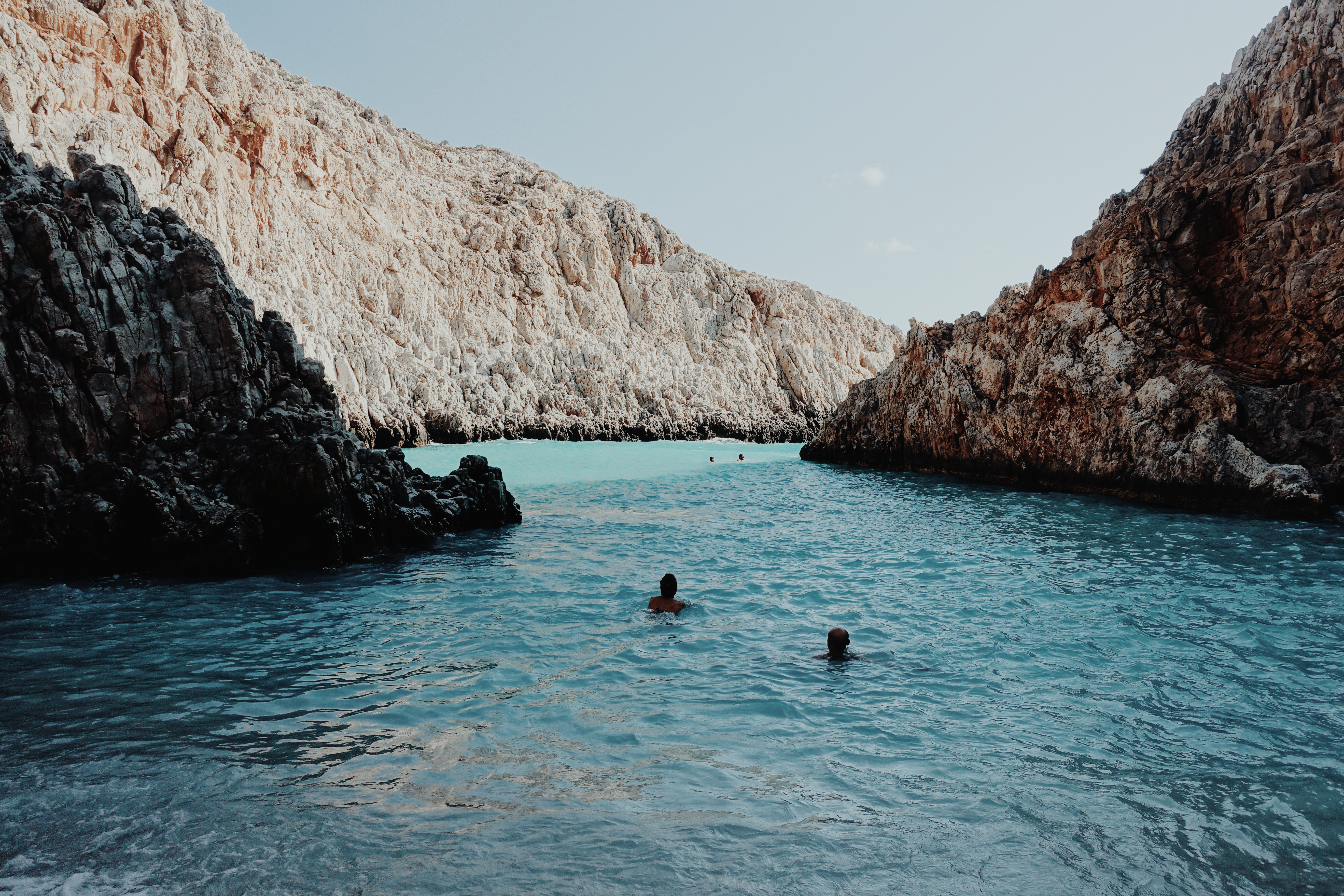 people in the middle of ocean