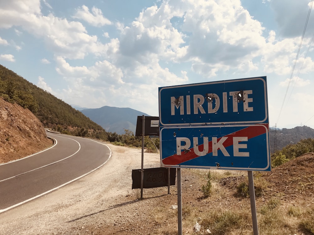 Mirdite Puke road signage on hill