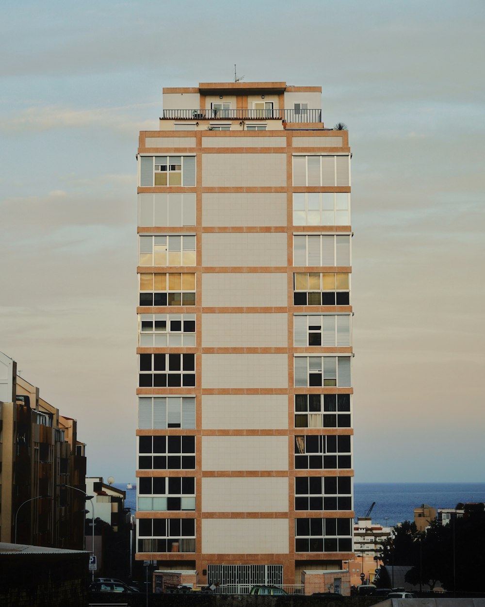 low angle photo of curtain glass wall building