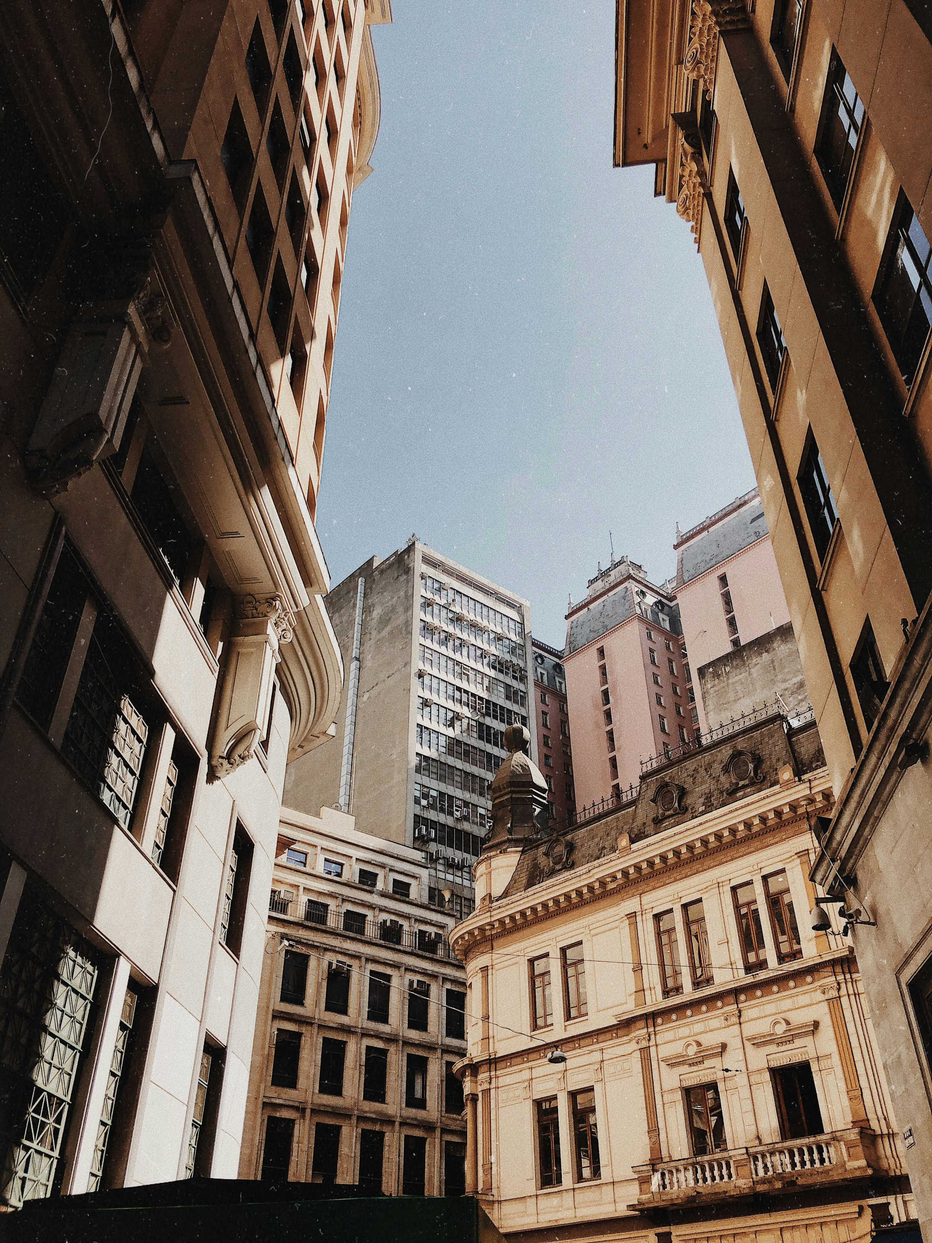 low-angle photograph of concrete structures