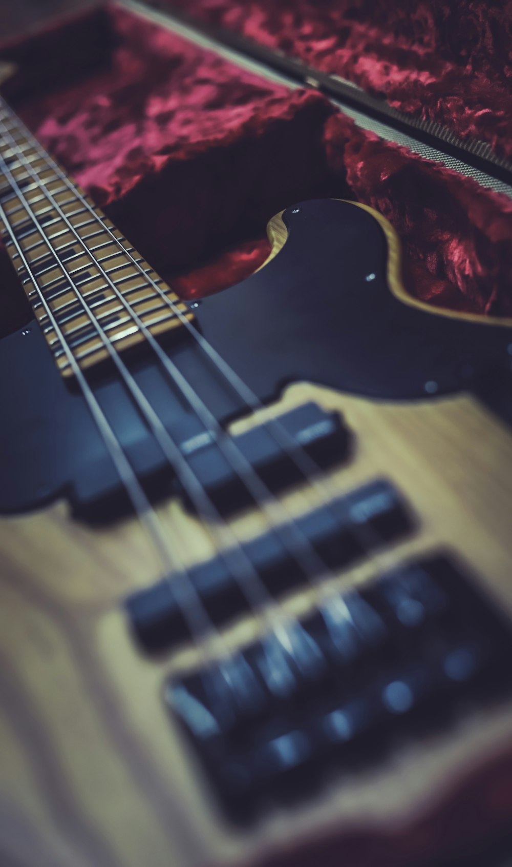 black and brown electric guitar