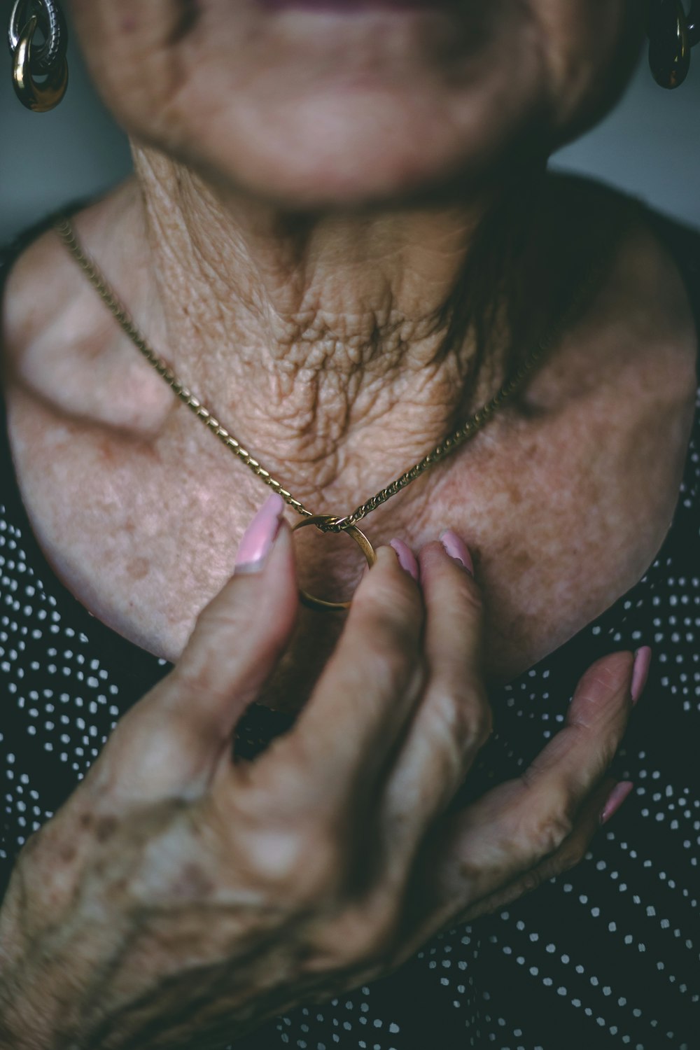 gold-colored necklace