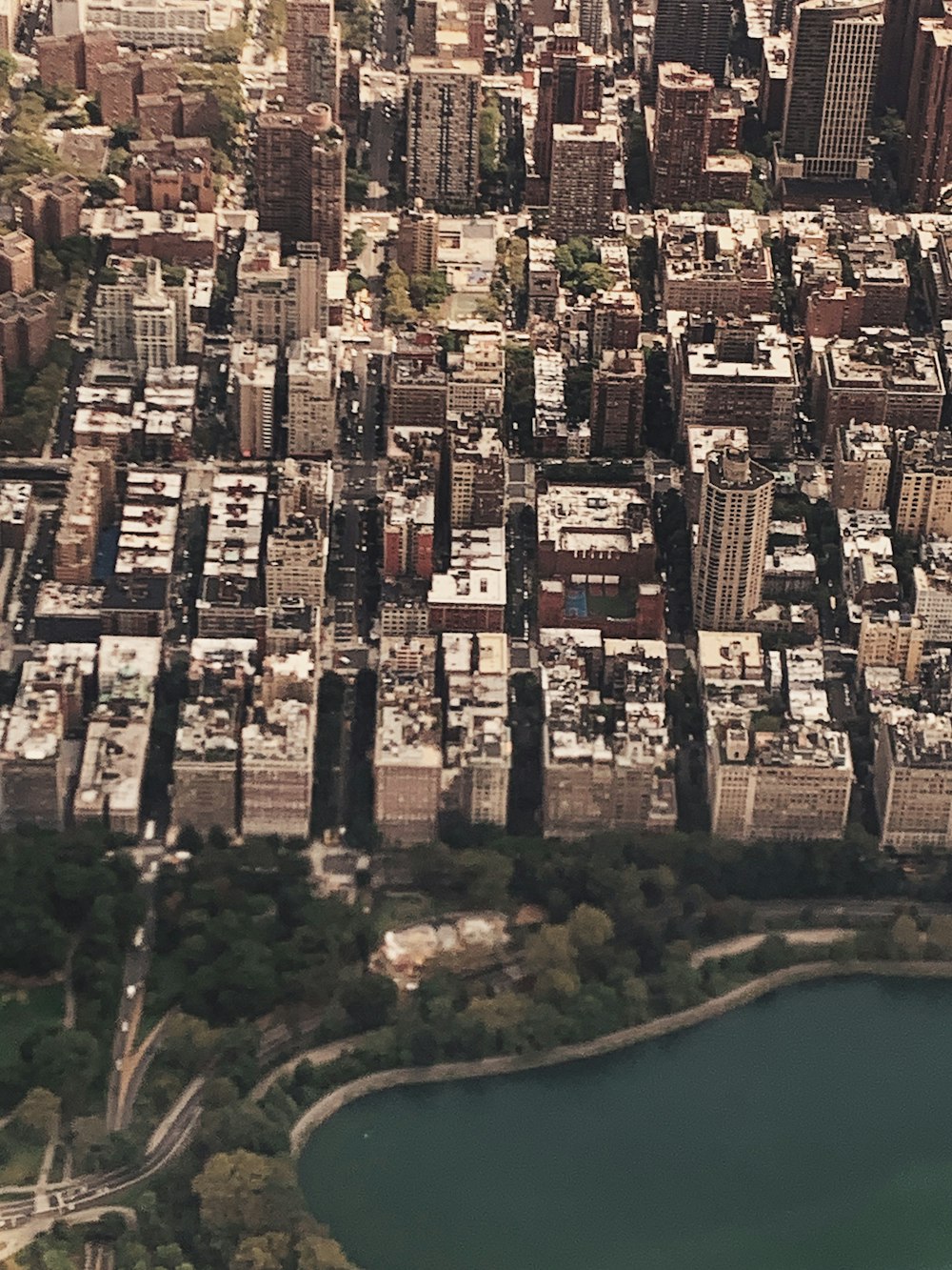 white and black concrete buildings high-angle photography