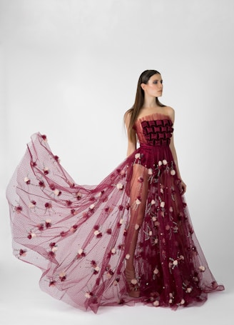 woman in maroon dress