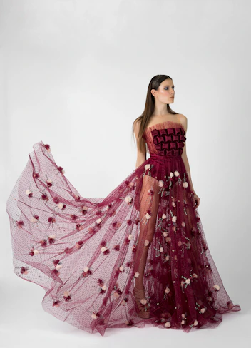 woman in maroon dress