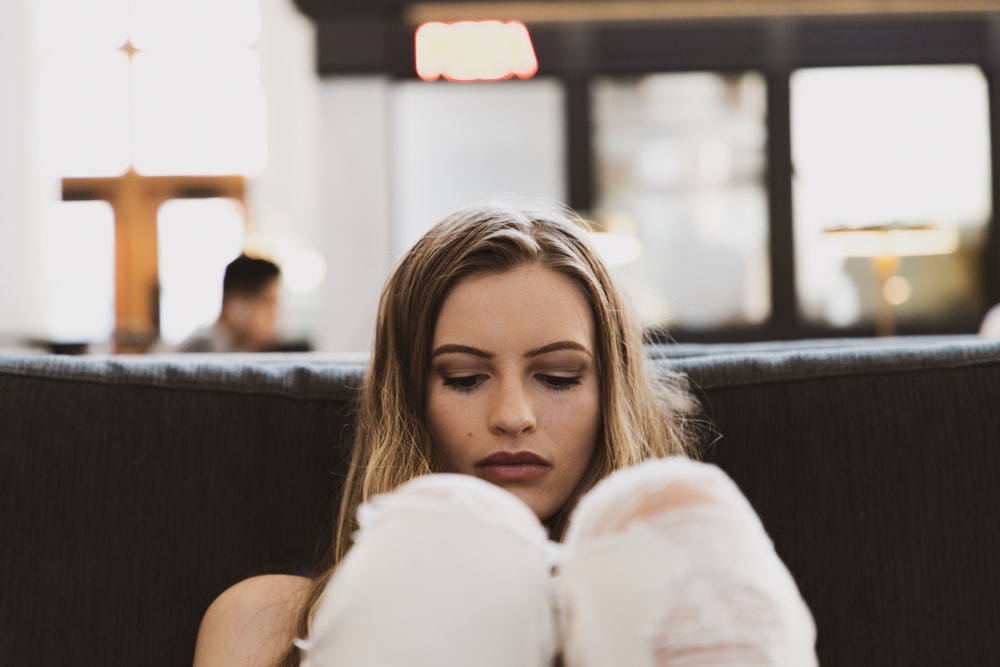 shallow focus photo of woman