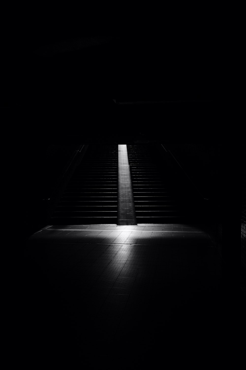 empty stairwell in dim room