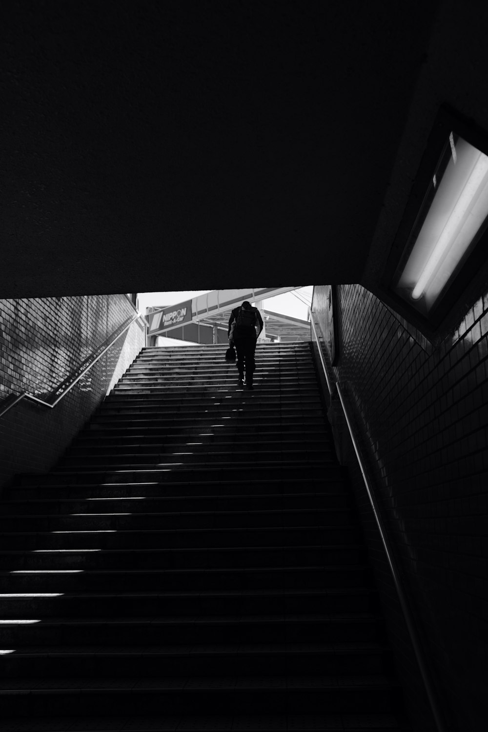 man climbing up stairs